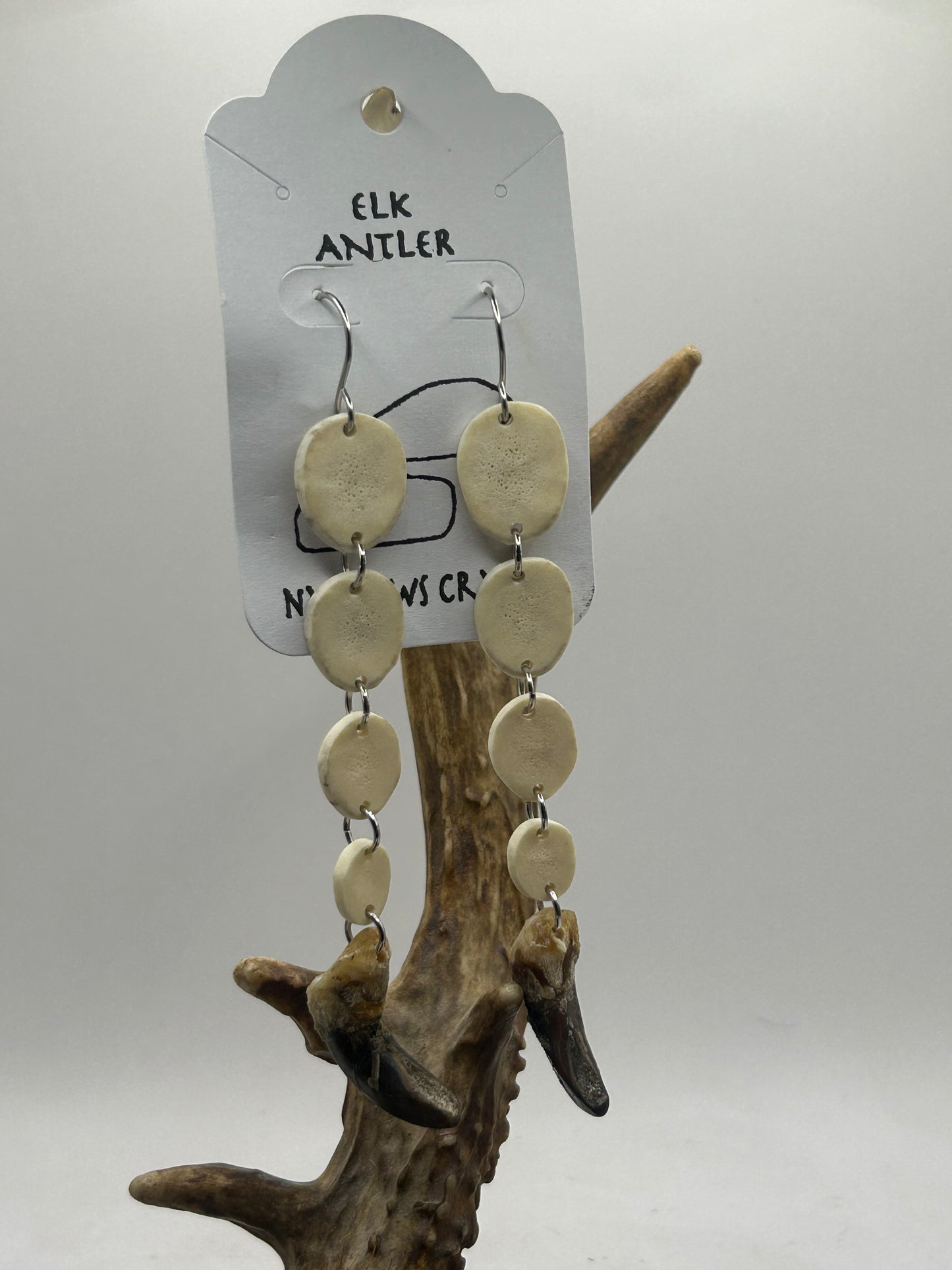Elk and wolf claw