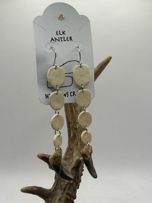Elk and wolf claw