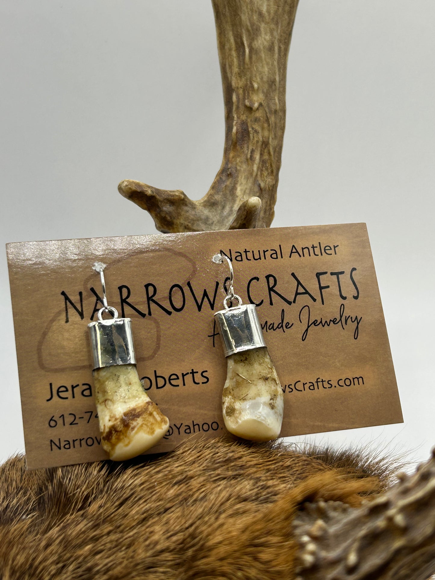 Elk ivories and silver tops